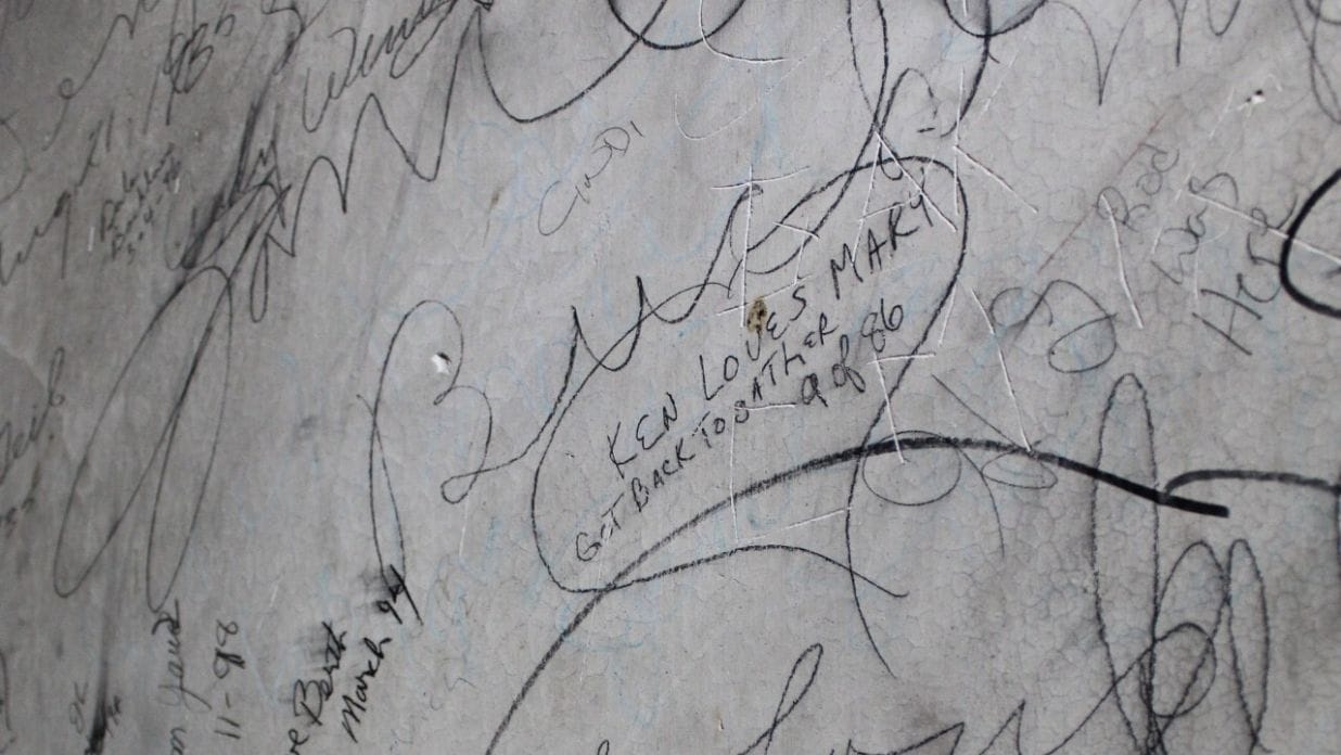 Century-old graffiti inside the 1889 Courthouse of The Tower Heritage Center